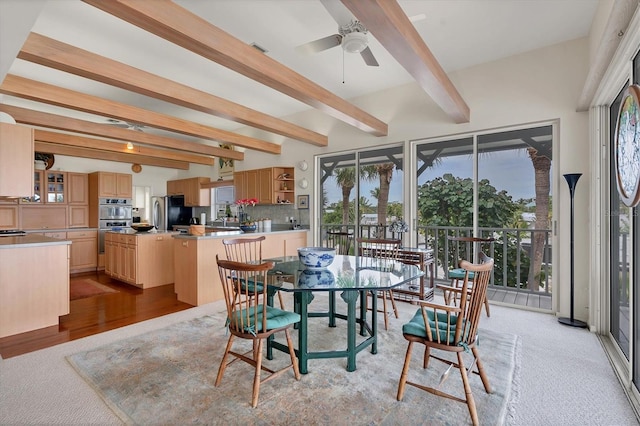 dining room featuring beam ceiling