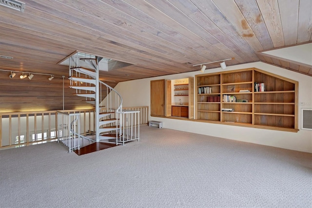 bonus room featuring carpet floors and wooden ceiling