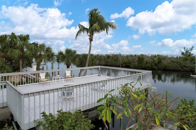 view of swimming pool featuring a water view