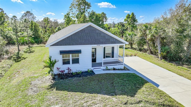 view of front of home featuring a front lawn and a porch