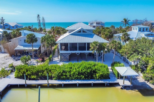 bird's eye view with a water view