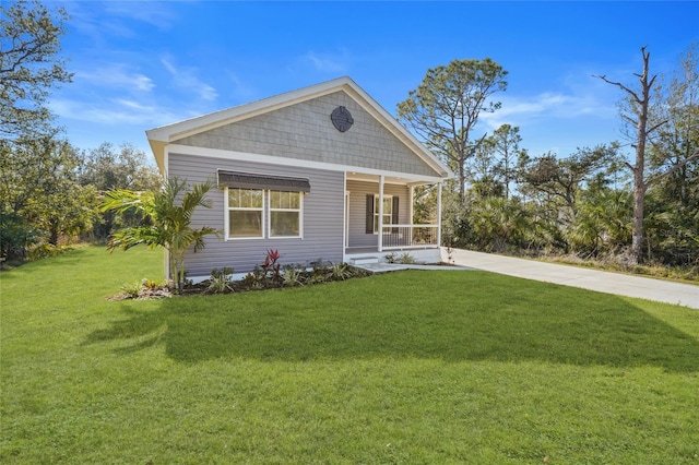 view of front of home featuring a porch and a front lawn