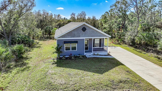 view of front of house featuring a porch and a front yard