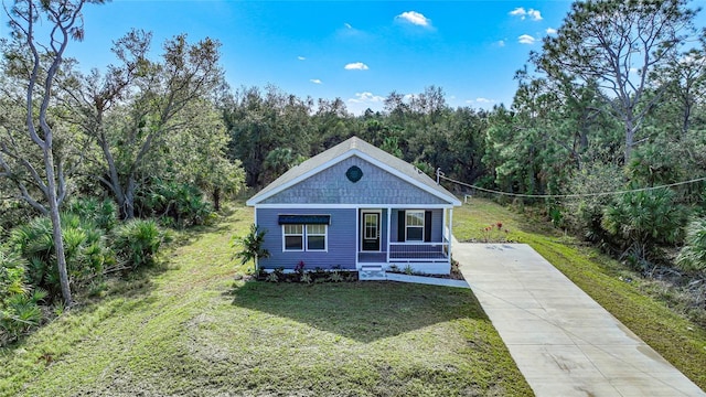 view of front of home featuring a front lawn and a porch