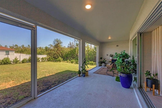 unfurnished sunroom featuring a healthy amount of sunlight