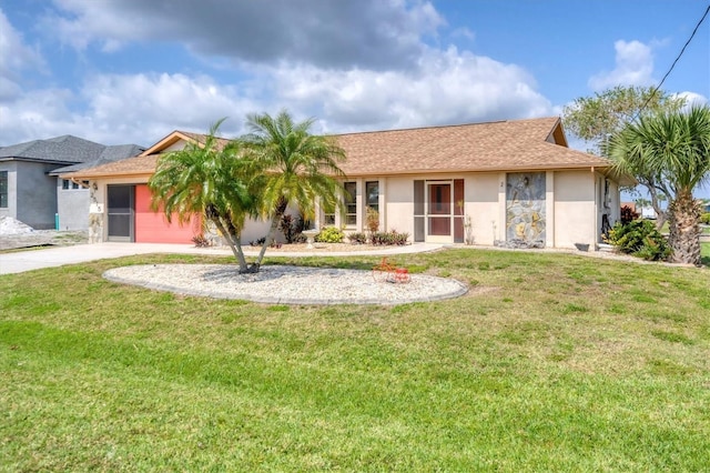 ranch-style home with a front lawn