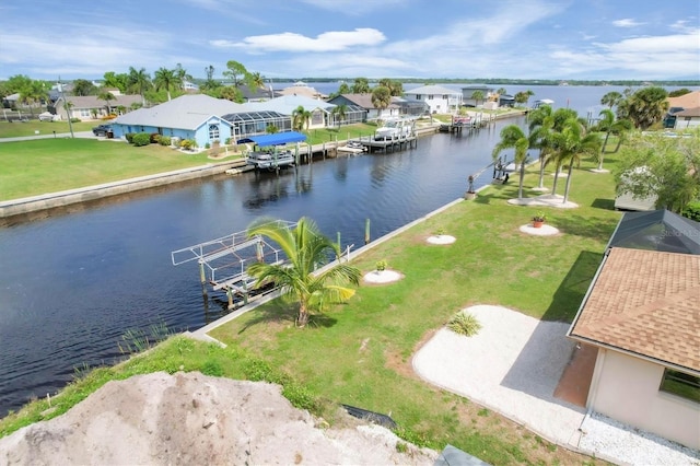 drone / aerial view featuring a water view