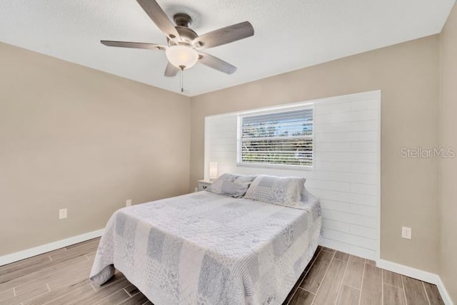 bedroom featuring ceiling fan