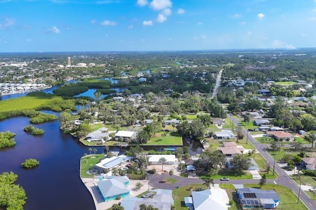 1493 Janet Pl, Englewood, FL 34223 - aerial perspective of suburban area featuring a large body of water