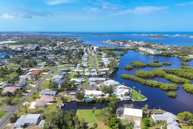 1493 Janet Pl, Englewood, FL 34223 - aerial view of residential area with a large body of water