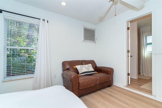 bedroom featuring light hardwood / wood-style floors and ceiling fan