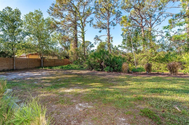 view of yard with fence