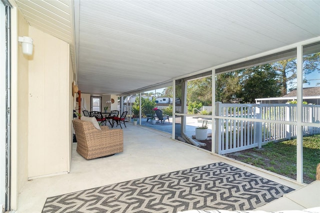 view of patio / terrace with outdoor dining area and fence