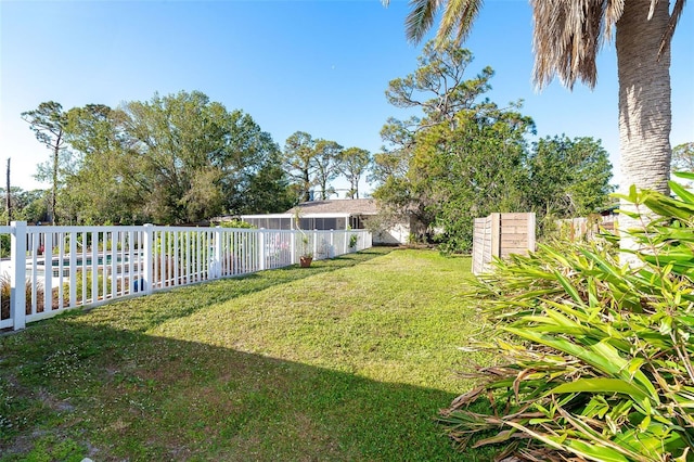 view of yard with fence