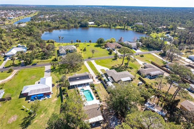 birds eye view of property featuring a water view and a residential view