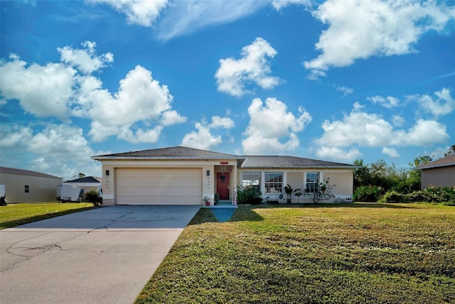 ranch-style home featuring a front lawn and a garage