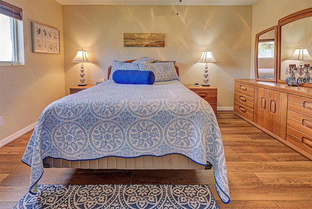 bedroom featuring hardwood / wood-style floors