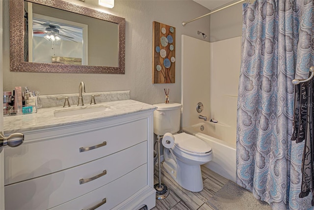 full bathroom featuring vanity, toilet, and shower / bath combo with shower curtain