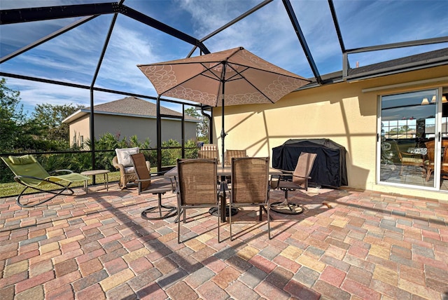 view of patio / terrace with glass enclosure