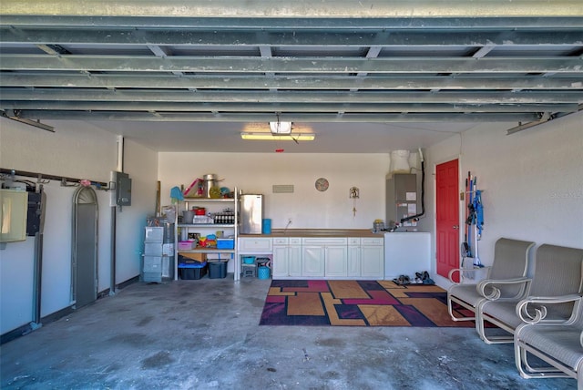 garage with heating unit and a garage door opener