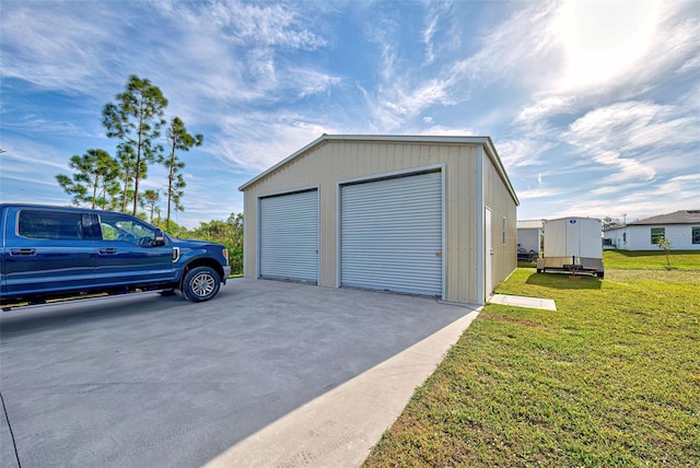 garage with a lawn