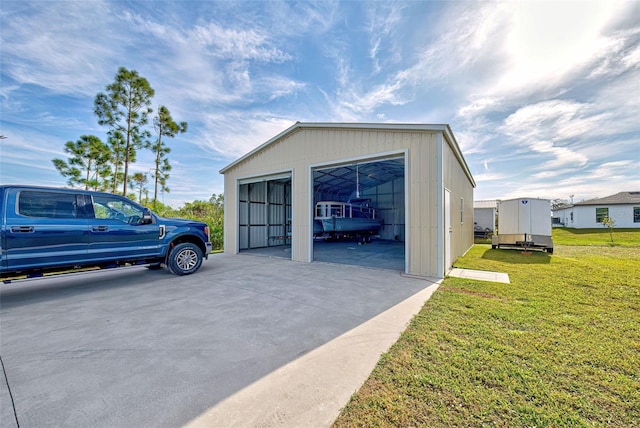 garage with a lawn