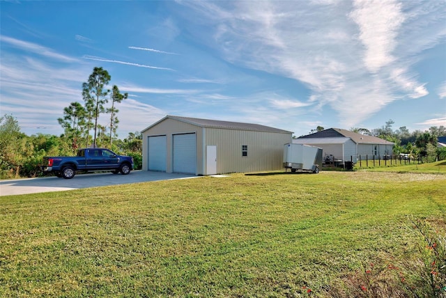 exterior space with an outbuilding and a garage