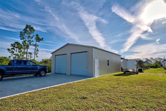 garage with a lawn