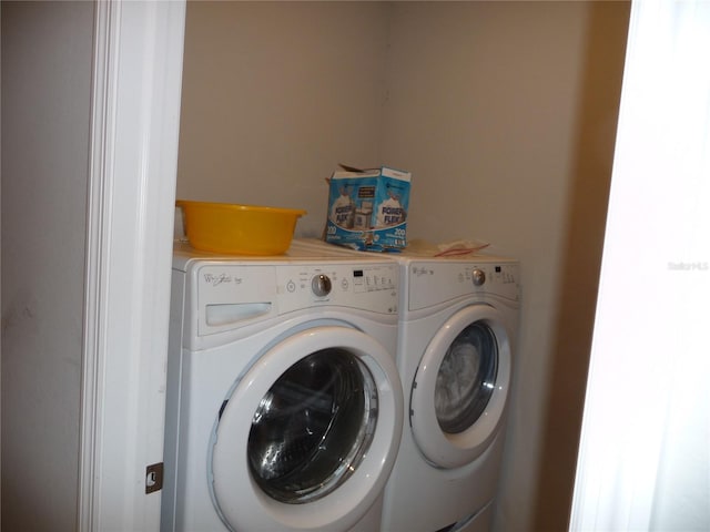 laundry room with washer and clothes dryer