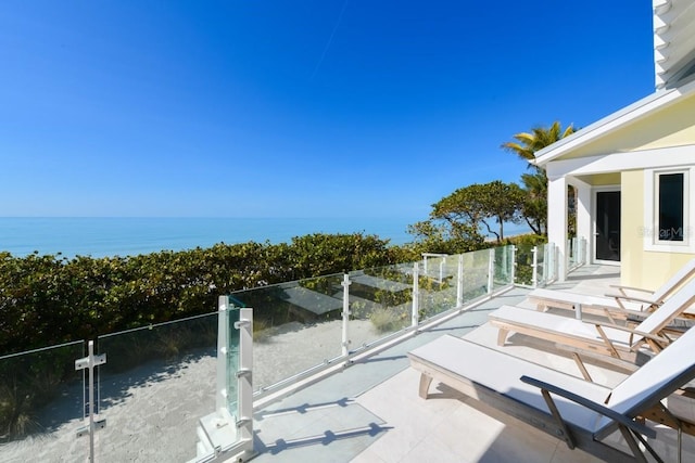 view of patio / terrace featuring a water view