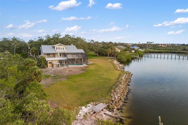 drone / aerial view featuring a water view