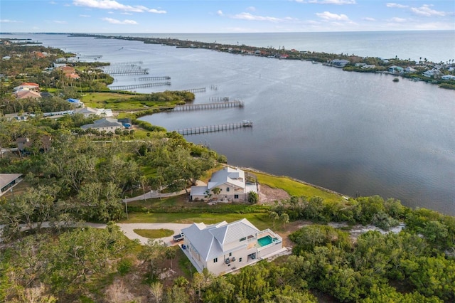 drone / aerial view with a water view