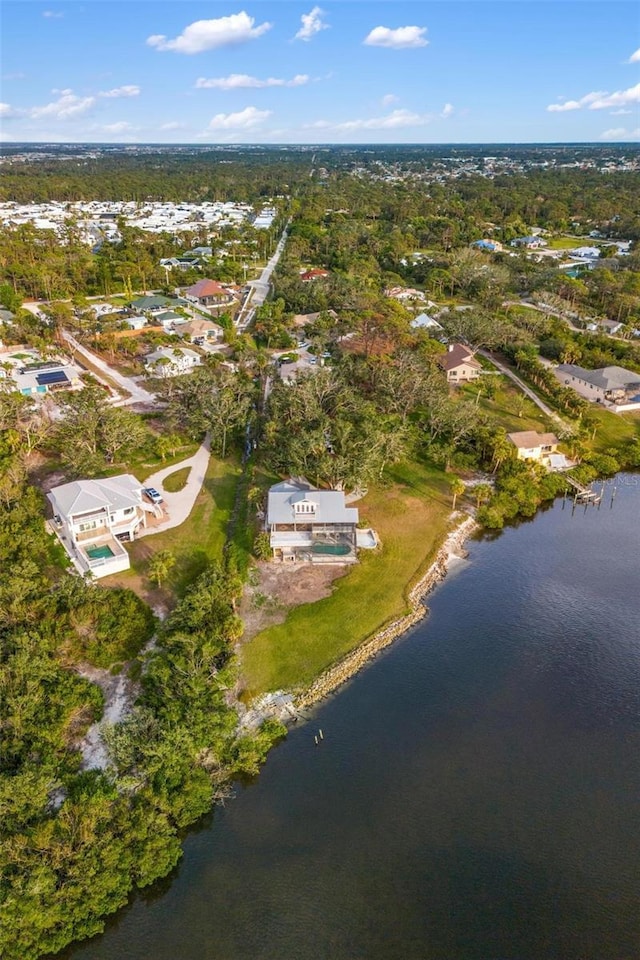 bird's eye view with a water view