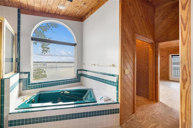 bathroom featuring tile patterned flooring, plus walk in shower, and wood ceiling