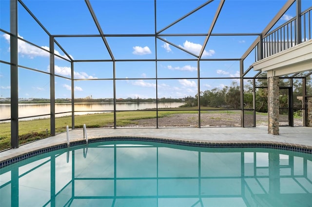 view of pool featuring a patio area and a lanai