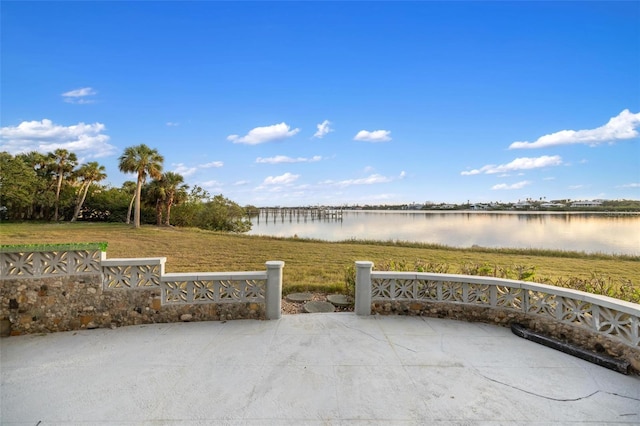 view of patio / terrace with a water view