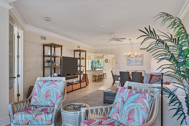 living room featuring ceiling fan with notable chandelier, light tile patterned floors, and crown molding