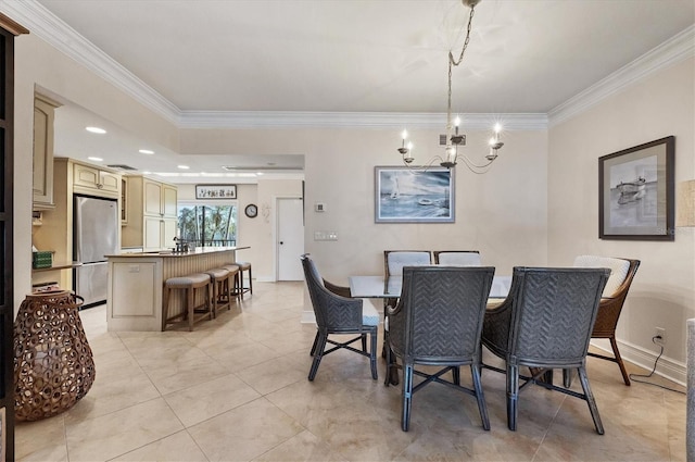 tiled dining space featuring track lighting, an inviting chandelier, and crown molding
