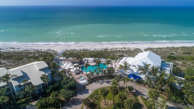 aerial view with a water view and a view of the beach