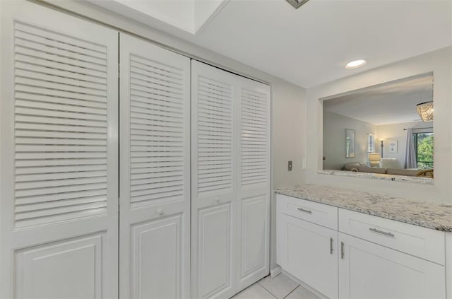 bathroom featuring tile patterned floors and vanity