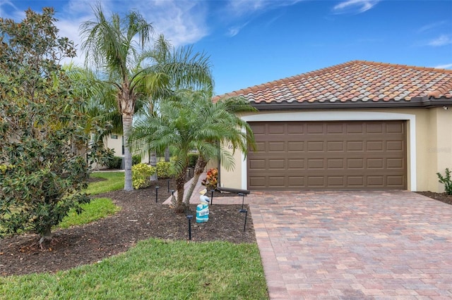 view of front of home with a garage