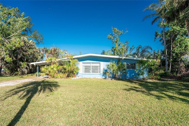 1770 Hudson St, Englewood, FL 34223 - view of front of home featuring a front lawn