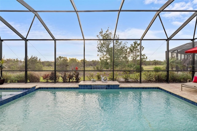 view of swimming pool with a patio area