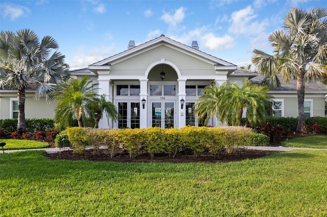 view of front of home with a front yard