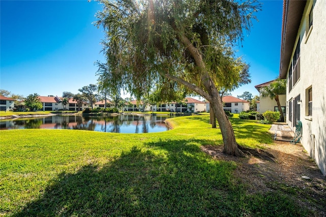 view of yard with a water view