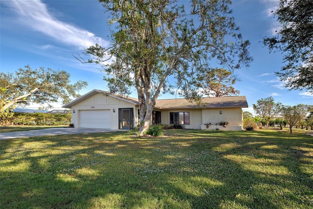 single story home featuring a garage and a front lawn