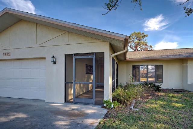 entrance to property featuring a garage