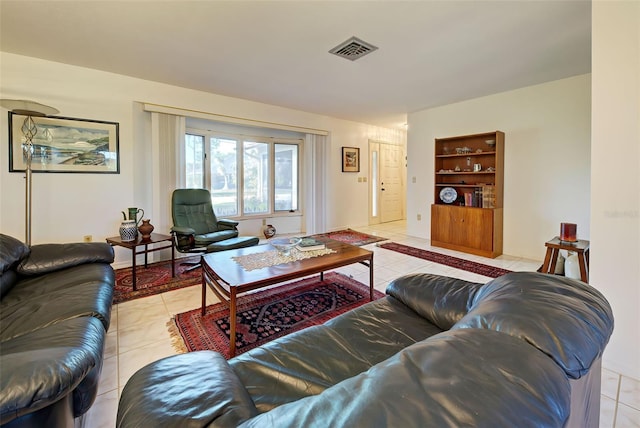 living room with light tile patterned floors