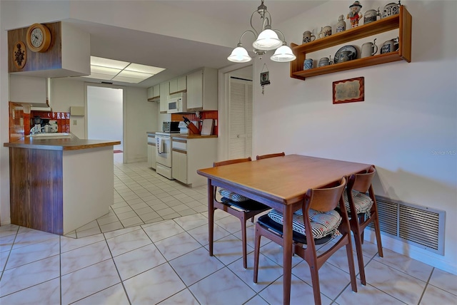 view of tiled dining space