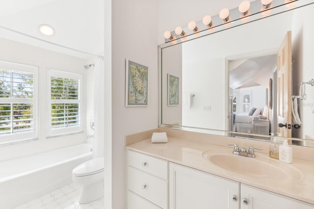 full bath with toilet and vanity